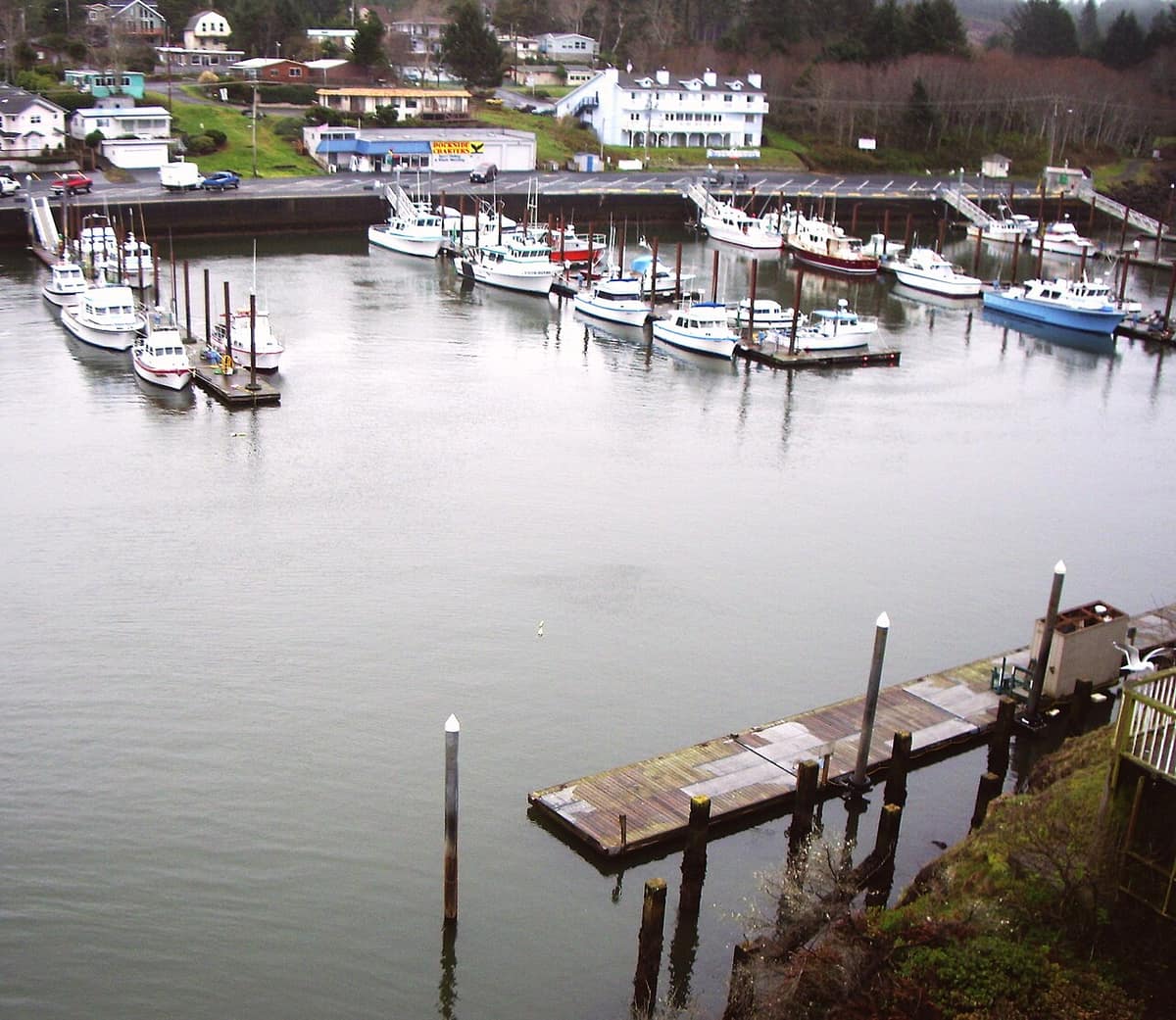 fishing and charter boats moored in the small Depoe Bay harbor