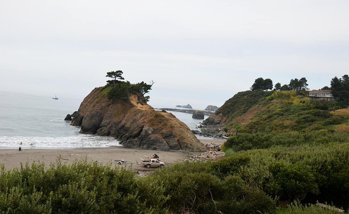 Battle Rock and the beach below it in Port Orford, Oregon